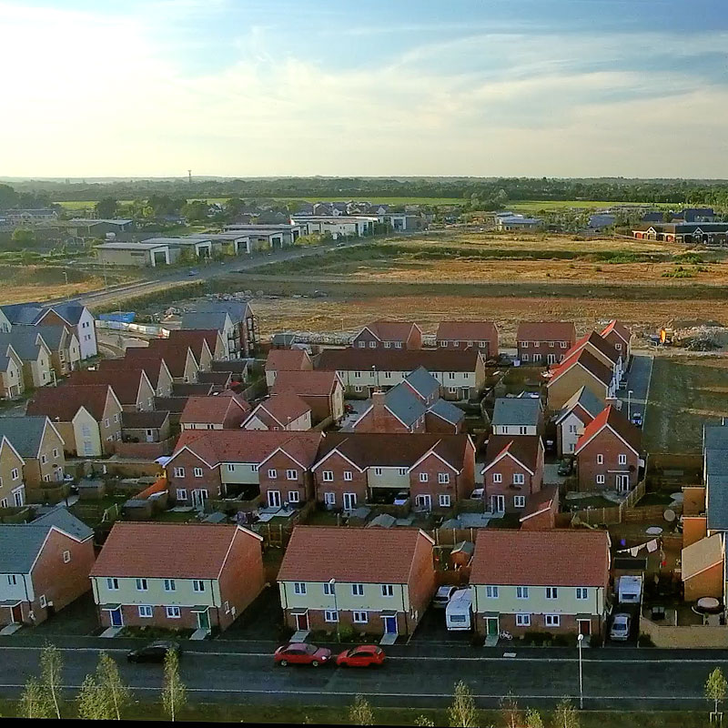 Aerial photograph of a new greenfield housing development and building site in Essex. 