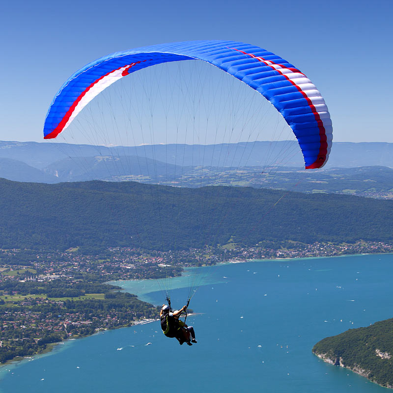 Aerial photograph of a paraglider over the Alps