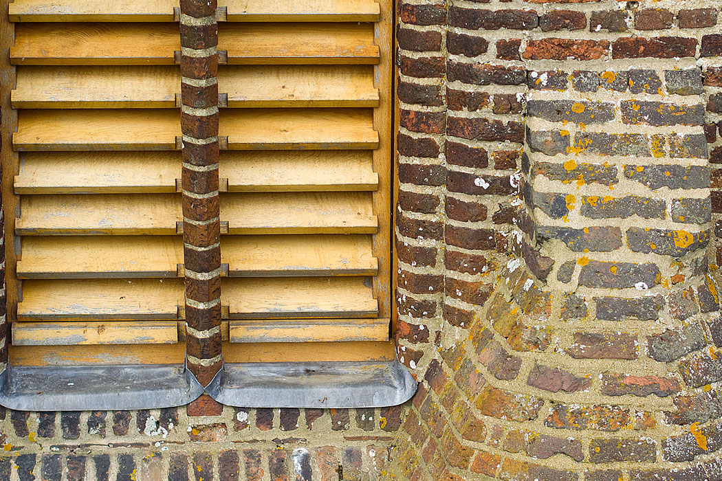 Aerial photography of flashing and brickwork details on a refurbished church roof