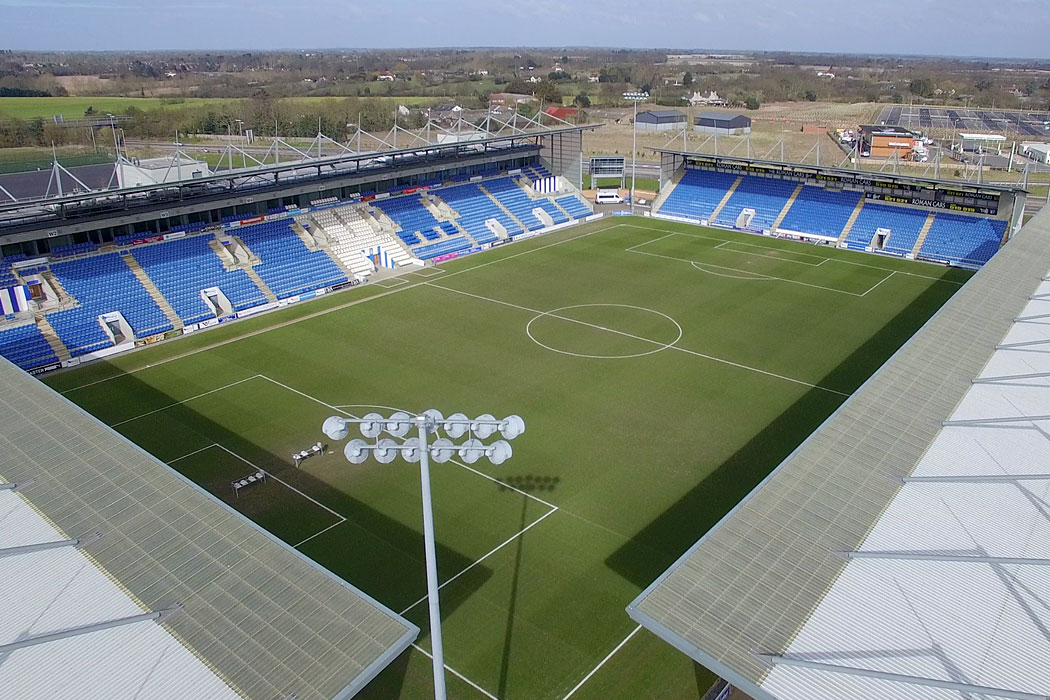 Aerial photography of Colchester United football stadium in Colchester, Essex, UK